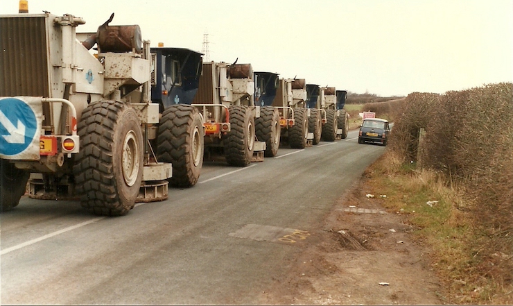 seismic truck convoy